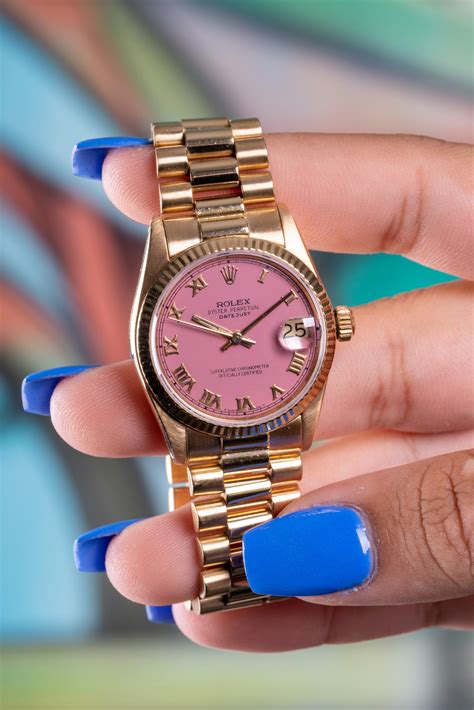 pink dial rolex|Rolex pink face with diamonds.